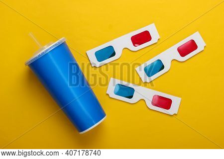 Movie Time. Stereoscopic Anaglyph Disposable Paper 3d Glasses, Paper Cup Of Drink On Yellow Backgrou