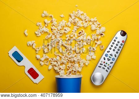 Movie Time. Cardboard Bucket Of Popcorn, Tv Remote And Stereoscopic Anaglyph Disposable Paper 3d Gla