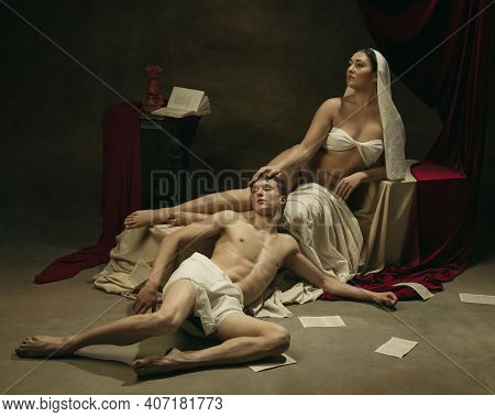 Falling In Love. Modern Remake Of Classical Artwork - Young Medieval Couple On Dark Background, Gold