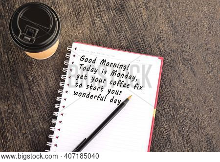 Text On Notepad With Disposable Coffee Cup And Pen On Wooden Table