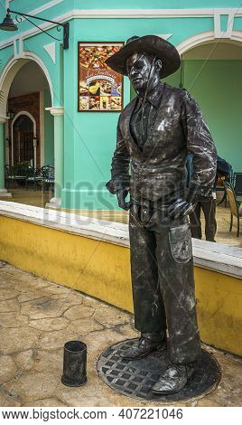 Cayo Santa Maria, Cuba, February 2016 - Street Mime In Black Cowboy Outfit Standing In A Corner Of L