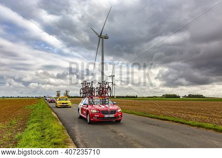 Le Gault-saint-denis, France - October 08, 2017: Row Of Technical Vehicles Driving On A Road In The 