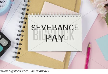 Paper With Severance Pay On A Notepad