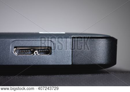 Gray External Hard Drive With Usb 3.0 Micro-b Port. Close-up Of The Port