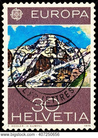 Moscow, Russia - February 08, 2021: Stamp Printed In Switzerland Shows Painting Monch Mountain (bern