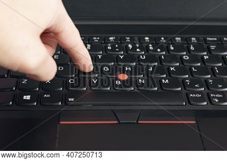 Novopolotsk, Belarus - 06 February, 2021: Lenovo Laptop Keyboard And Hand Close Up