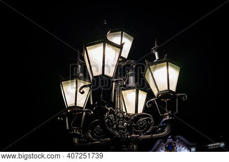 A Photo Of A Historical Lantern From The Estonian Capital Talinn During The Night