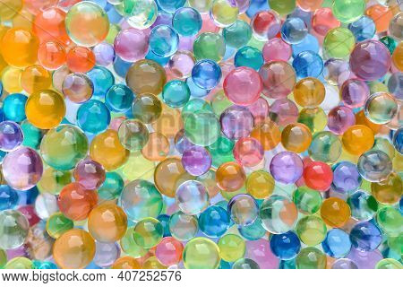 Abstract Multicolored Bright Background With Hydrogel Beads Texture