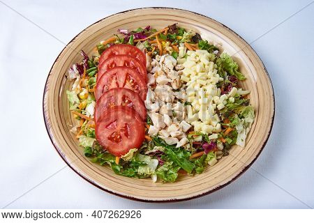 Green Salad With Chicken Cheese And Tomatoes