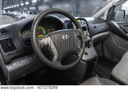 Novosibirsk, Russia - February 07 2021: Hyundai Starex, Auto Interior: Steering Wheel With  Logo    