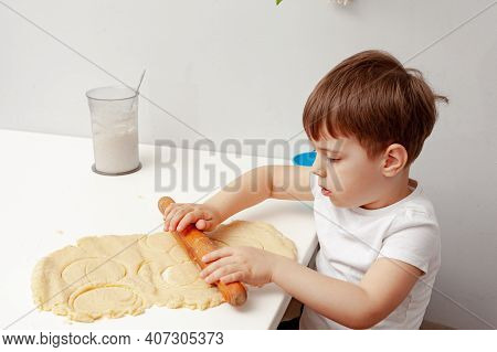 Little Boy Helps Mother To Cook  Making Homemade Coockies. Casual Lifestyle In Home Interior, Pretty