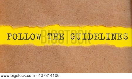 Follow The Guidelines Message Written Under Torn Paper. Business,