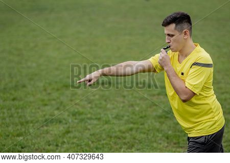 Referee Showing On Penalty While Gaming. Concept Of Sport, Rules Violation, Controversial Issues, Ob