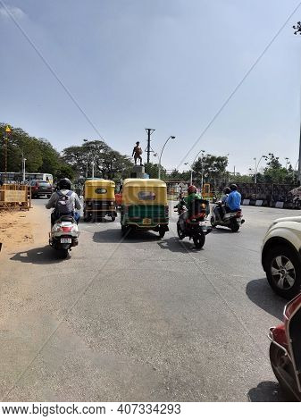 Closeup Of Heavy Traffic In A Sangolli Rayanna Statue Circle And Beautiful View Of Flyover Or Bridge