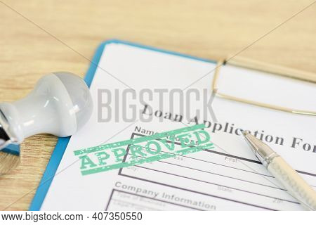 Loan Approval, Loan Application Form With Rubber Stamping That Says Loan Approved, Financial Loan Mo