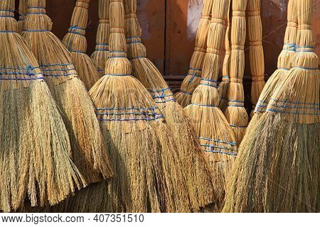 A Background Of Traditional Straw Brooms In The Lebanese Town Of Batroun.