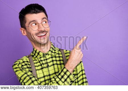 Portrait Of Young Happy Excited Positive Cheerful Man In Glasses Look Point Finger Copyspace Isolate