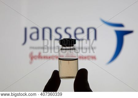 Oxford, Uk - February 2020: A Covid Vaccine Vial Against The Janssen Logo
