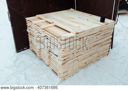 Warehouse Of Wooden Boards, Background Texture Of Wood Harvested For Shipment To The Factory, Finish