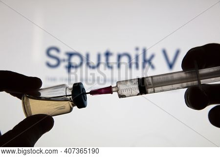 Oxford, Uk - February 2020: Sputnik V Covid Vaccine Logo With Syringe And Vial
