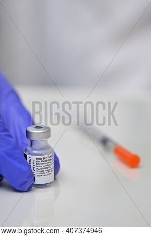 Romania, Galati, 08.02.2021 Pfizer And Biontech Covid-19 Vaccine. Small Ampoules With Vaccine