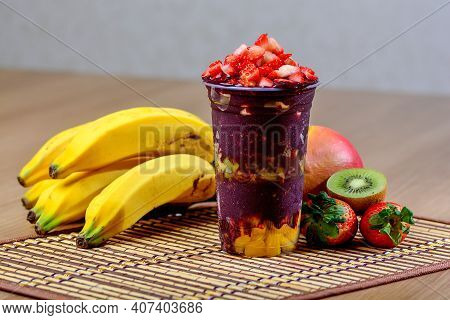 Acai Cup With Strawberry Topping Banana, Kiwi, Delicious Brazilian Açaí Creamy