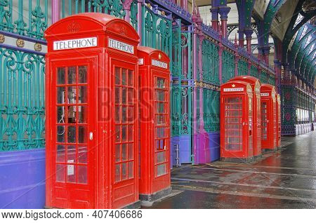 Public Telephone Boxes In Historic Smithfield Market In London.