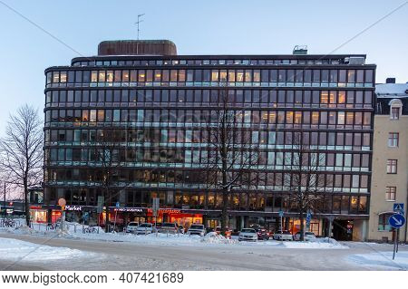 Helsinki, Finland January 4, 2021 Hakaniemi District Modern Office View At Sunset. Winter Evening. H