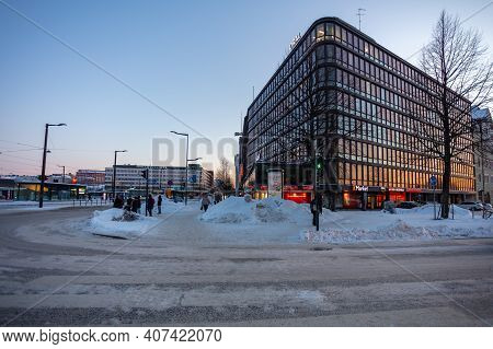 Helsinki, Finland January 4, 2021 Hakaniemi District Modern Office View At Sunset. Winter Evening. H