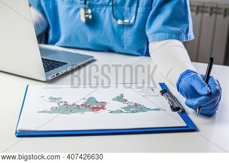 Medical Worker Analyzing Covid-19 World Map,coronavirus Global Pandemic Outbreak Crisis,stats Showin