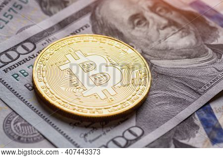 Golden Bitcoin Lies On The Banknotes.new Virtual Money. Crypto Currency Top View. Real Coins Of Bitc