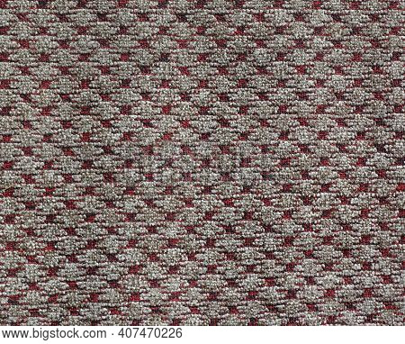An Old Carpet With A Geometric Pattern