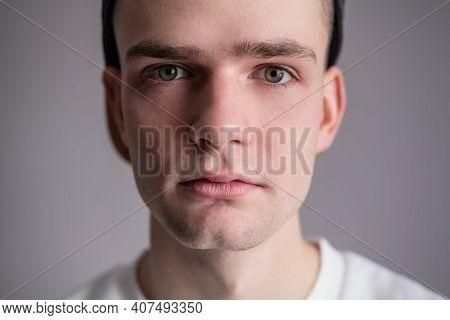 Face Close Up, Portrait Of Sad Young Guy, Teenager