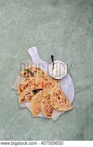 Baked Bread With Vegetable Filling On A Stone Background. Selective Focus.