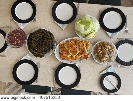 Turkish Food Table With Borek Or Burek, Stuffed Grape Leaves Dolma, Meatballs Kofte Or Kofta And Mer