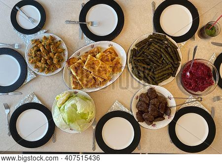 Turkish Food Table With Borek Or Burek, Stuffed Grape Leaves Dolma, Meatballs Kofte Or Kofta And Mer