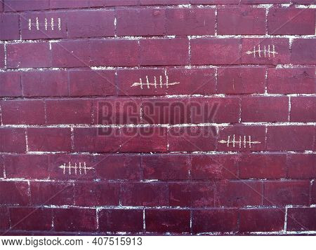 White Chalk Lines On The Brick Wall Counting Down The Days Until The Event