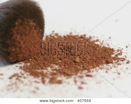 Cepillo con polvo de rubor