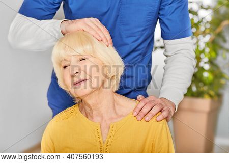 Senior Female Patient While Exercise Treatment For Neck With His Physiotherapist. Pain In Older Woma