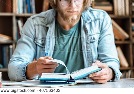 Closeup Young Man Student Teacher Home Library Desk Hold Open Turn Page Book Read Novel Volume Textb