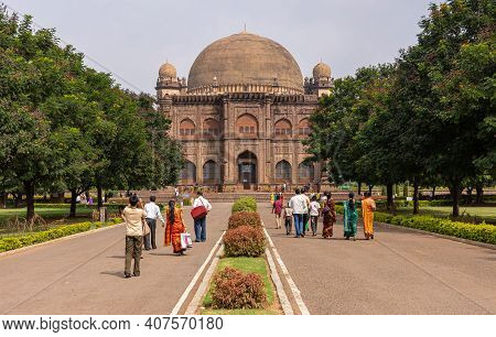Vijayapura, Karnataka, India - November 8, 2013: Gol Gambaz Mausoleum. People In Colorful Clothing A