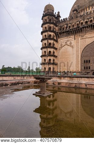 Vijayapura, Karnataka, India - November 8, 2013: Gol Gambaz Mausoleum. Double Brown-black Corner As 