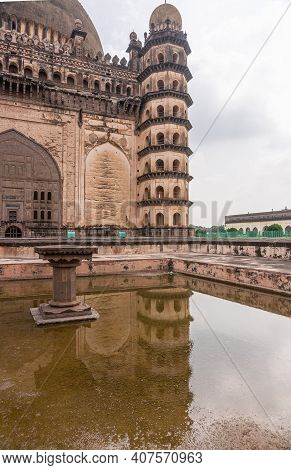 Vijayapura, Karnataka, India - November 8, 2013: Gol Gambaz Mausoleum. Double Brown-black Corner Tow