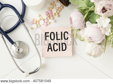 Folic Acid. Medicine Concept. Pink Paper Sticker With Inscription Folic Acid And Stethoscope, Medici