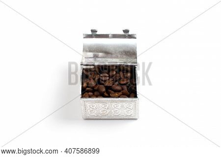 Roasted Coffee Beans In A Small Metal Chest. Isolate On A White Background.