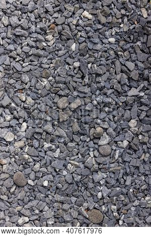 Stones Texture And Background. Rock Texture . Crushed Gravel Background. Seamless Texture Of Gravel 
