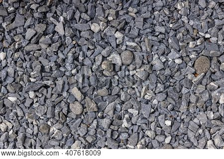 Stones Texture And Background. Rock Texture . Crushed Gravel Background. Seamless Texture Of Gravel 