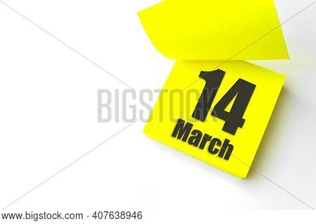 March 14th. Day 14 Of Month, Calendar Date. Close-up Blank Yellow Paper Reminder Sticky Note On Whit