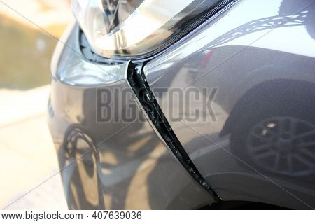 Gray Pick Up Car Broken On Front Of The Car