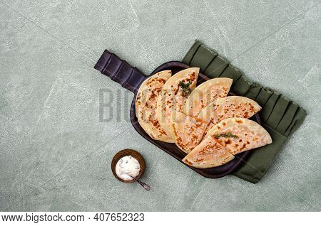 Baked Bread With Vegetable Filling On A Stone Background. Selective Focus.